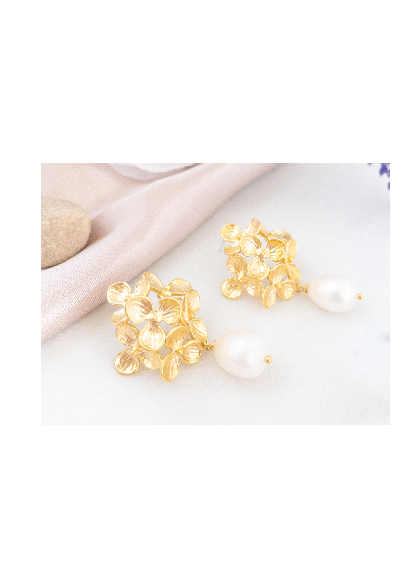 Floral drop earrings with gold flower clusters and pearl accents for an elegant look