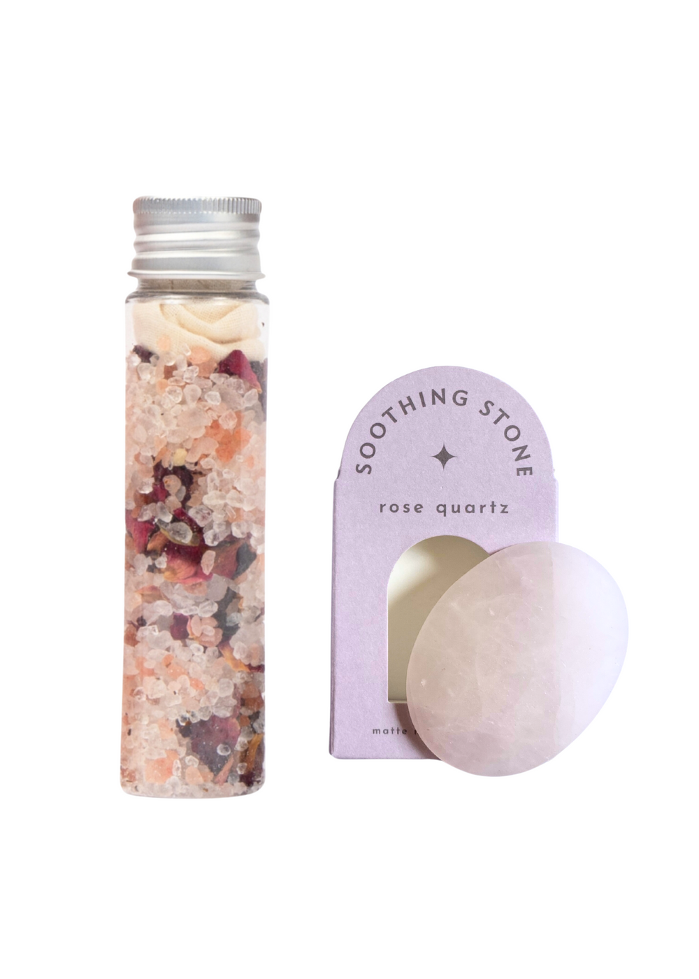 Luxury rose soaking salts featuring a blend of Pink Himalayan Salt, Coarse Sea Salt, Epsom Salt, Dried Rose Petals, and 100% Pure Essential Oils. Crafted for a serene bath experience, with organic rose and lavender essences for calming fragrance