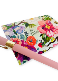 Refined ensemble featuring the Monaco Collection ballpoint pen with a fine 0.5mm point and sleek black ink for smooth, precise writing. Includes a Les Fleurs Postcard adorned with delicate floral motifs for adding charm to handwritten messages. Perfect for elegant writing experiences