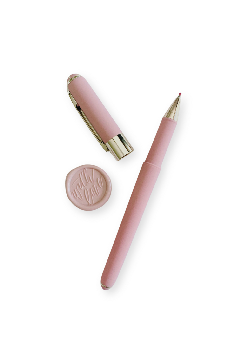 Monaco pink pen with a fine point and soft touch for effortless writing, paired with a handcrafted With Love Wax Seal featuring a convenient adhesive backing. Elevate your correspondence with precision, elegance, and old-world charm