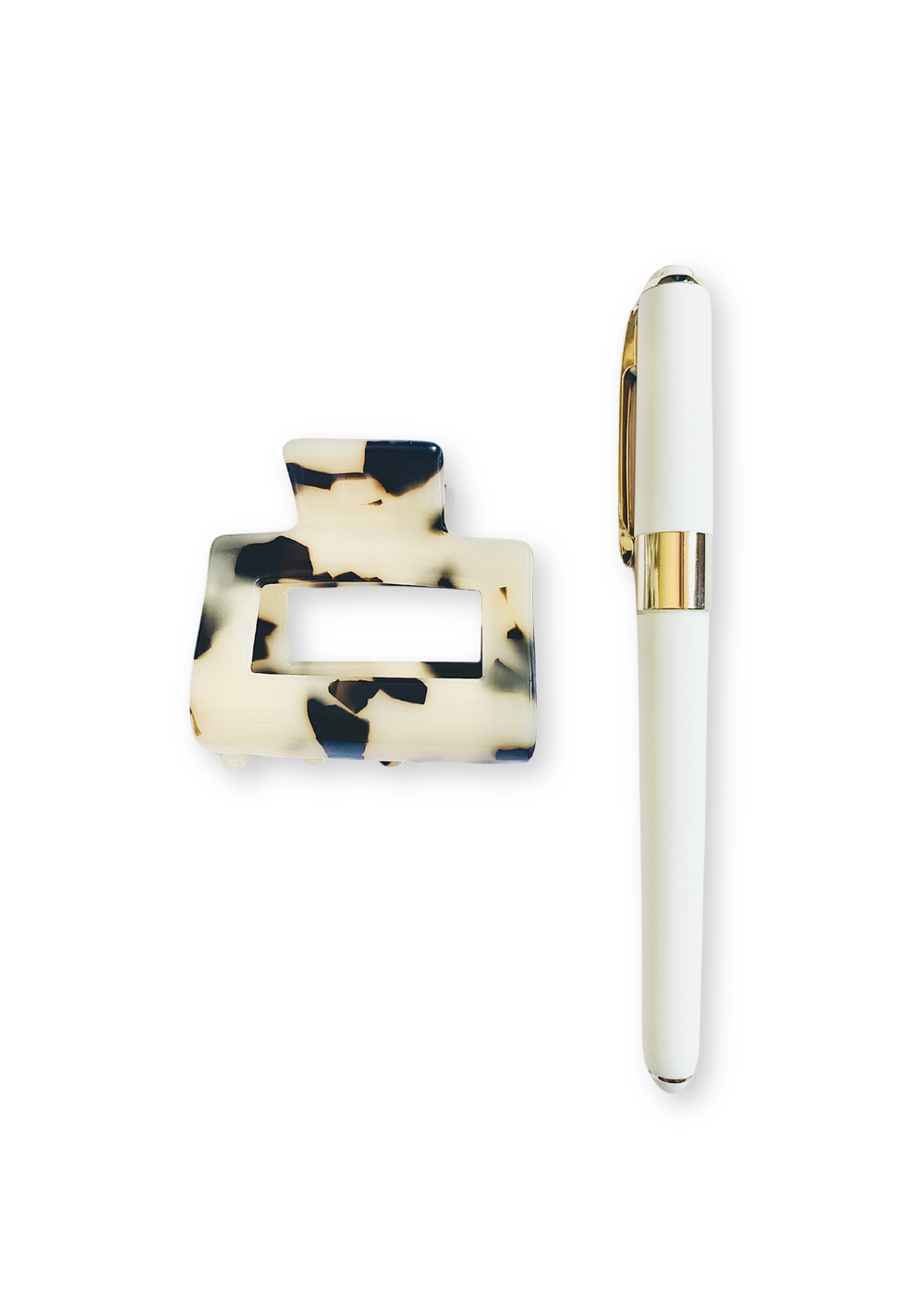 The Writer's Workshop party favor set includes the Monaco white pen from our prestigious collection, featuring a fine 0.5mm point and smooth black ink for precise writing. Also includes a Leopard Print Small Square Hair Clip (1.96" x 2.08") that adds a bold, elegant touch to any hairstyle. The clip color may vary